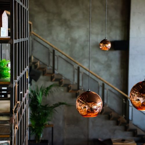 Interior decoration of stylish housing. Loft style incandescent lamp. Modern style home design